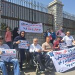 تجمع اعتراضی معلولان در مقابل مجلس شورای اسلامی